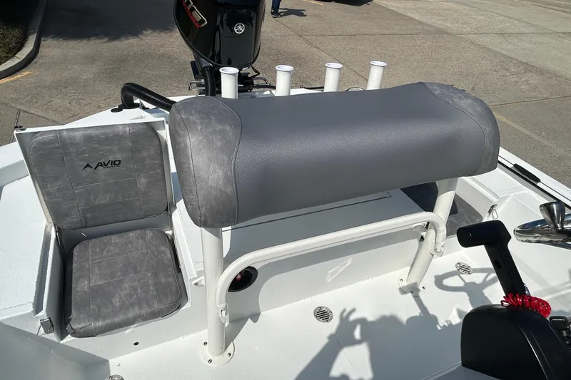 Slide: The Image of Avid 21 Recon 2026 boat interior with seating and controls. - 8