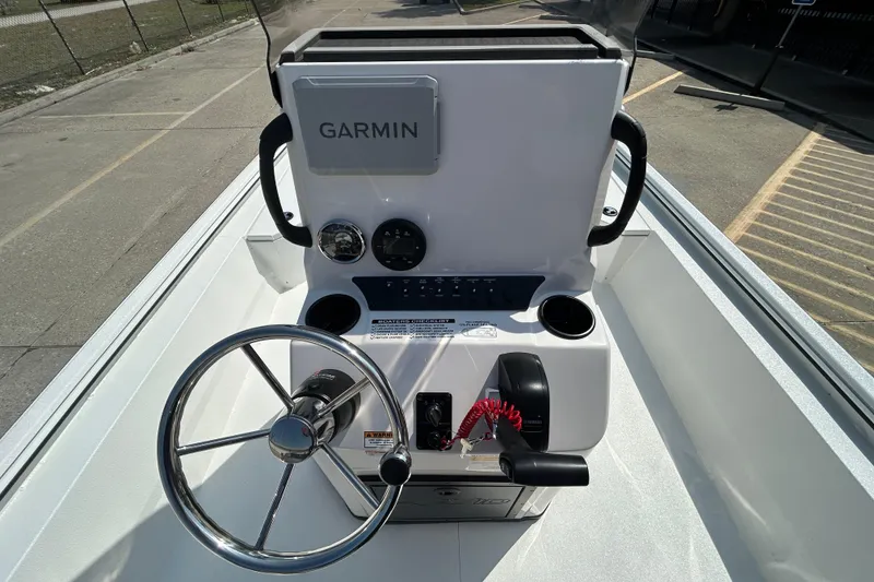 Slide: The Image of Steering console of 2026 Avid 21 Recon boat with Garmin navigation system. - 9