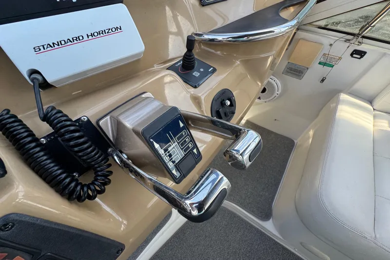 Slide: The Image of Control panel of 2004 Carver 444 Cockpit Motor Yacht with Standard Horizon equipment. - 21