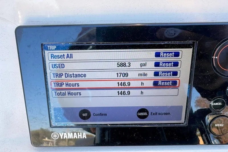 Slide: The Image of Yamaha display showing trip data: 588.3 gallons used, 1709 miles, 146.9 hours. Scout 251 XS 2016. - 10
