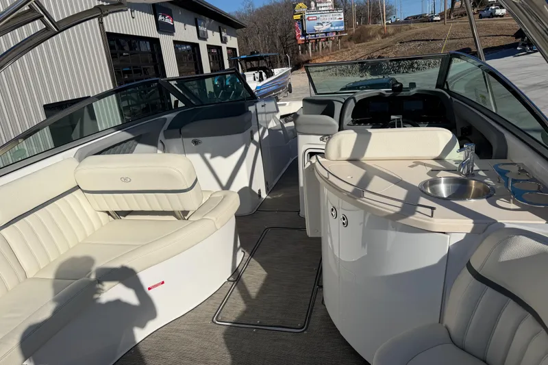 Slide: The Image of Interior of a 2019 Cobalt R35 boat with seating and a small sink. - 17