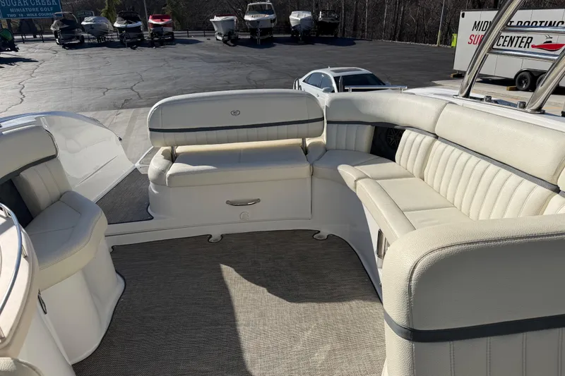 Slide: The Image of 2019 Cobalt R35 boat interior with white seating and spacious layout. - 20