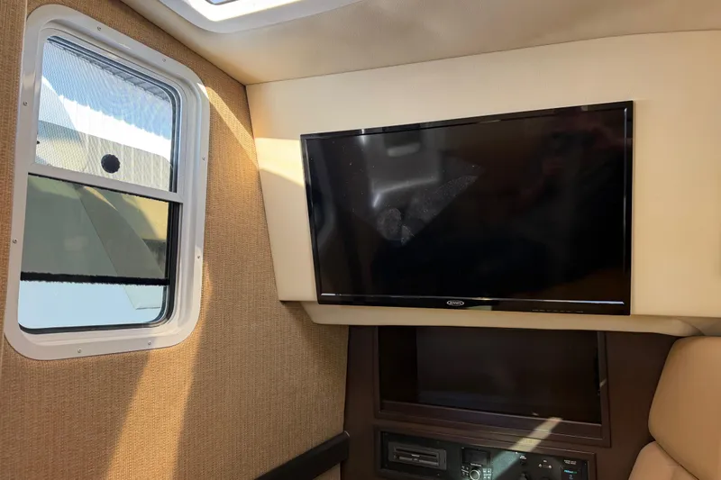 Slide: The Image of Interior of 2019 Cobalt R35 boat with TV and window. - 24