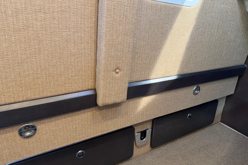 Slide: The Image of 2019 Cobalt R35 interior with beige upholstery and storage compartments. - 26