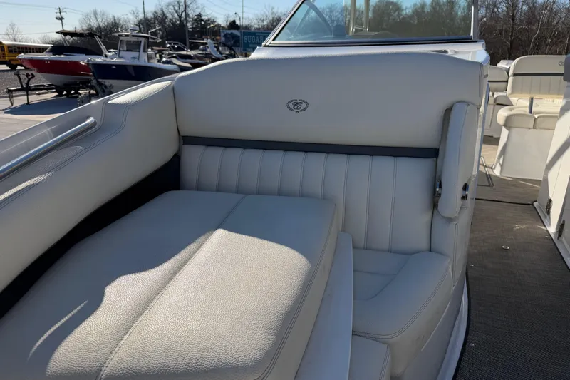Slide: The Image of 2019 Cobalt R35 boat interior with white leather seating and sleek design. - 34