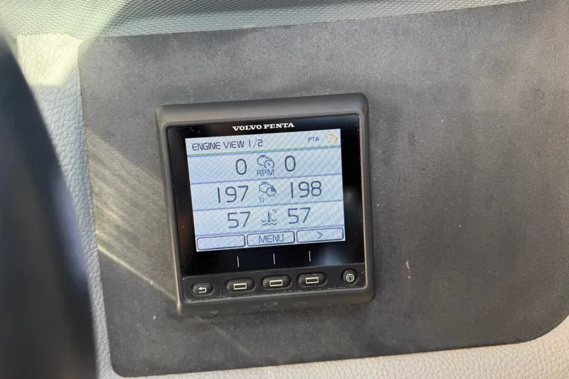Slide: The Image of Volvo Penta engine display in 2019 Cobalt R35 boat showing RPM and temperature. - 37