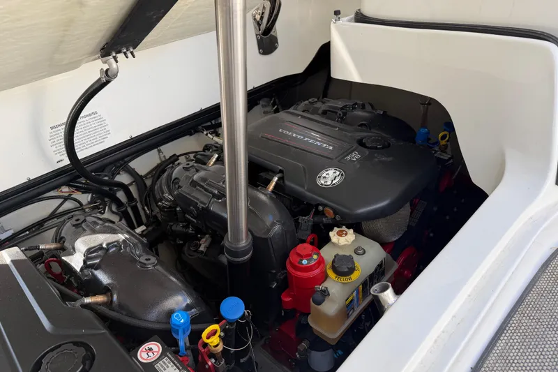Slide: The Image of Engine compartment of a 2019 Cobalt R35 boat, featuring a Volvo Penta engine. - 42