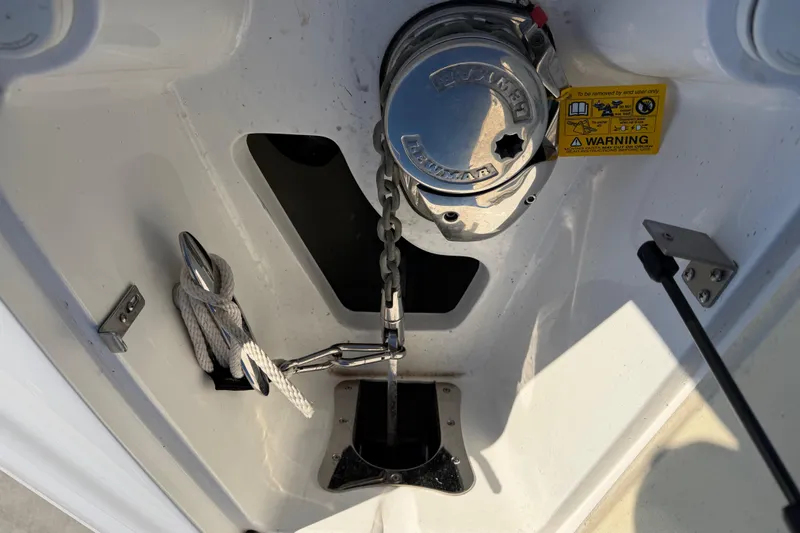 Slide: The Image of Anchor compartment of 2019 Cobalt R35 boat with chain and rope storage. - 44