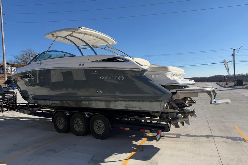 Slide: The Image of 2019 Cobalt R35 boat on trailer under clear blue sky. - 7