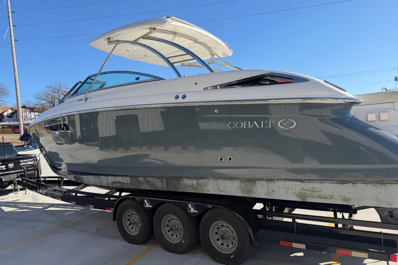 Slide: The Image of 2019 Cobalt R35 boat on trailer, sleek design, parked outdoors. - 8