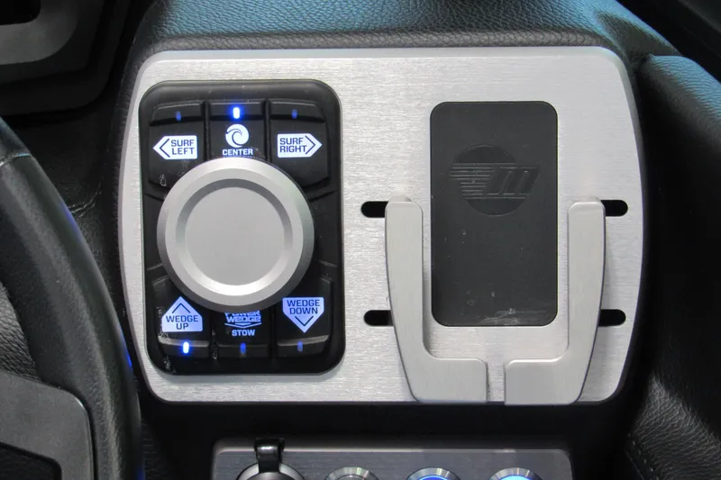 Slide: The Image of Control panel of 2021 Malibu Wakesetter 24 MXZ with surf and wedge adjustments. - 10
