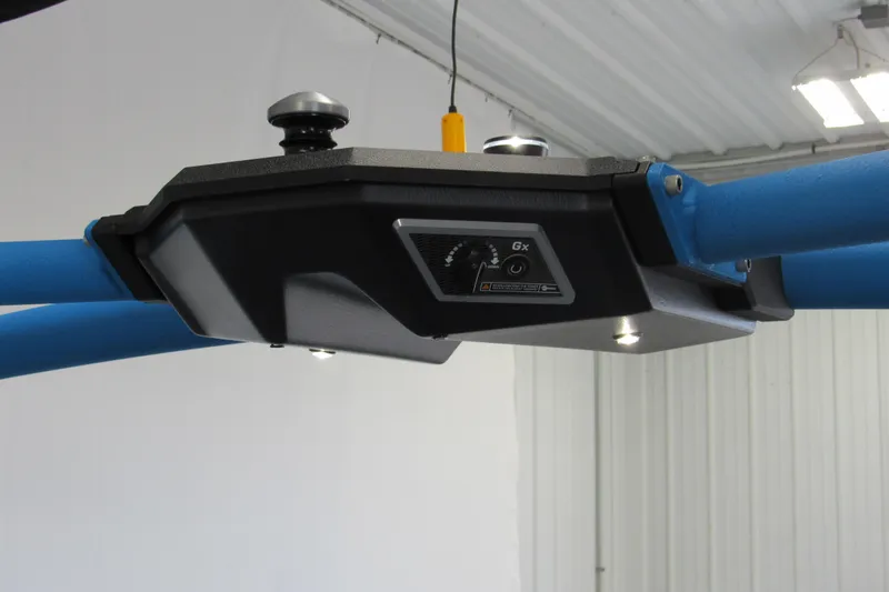 Slide: The Image of 2021 Malibu Wakesetter 24 MXZ control panel with blue framework and lighting. - 13