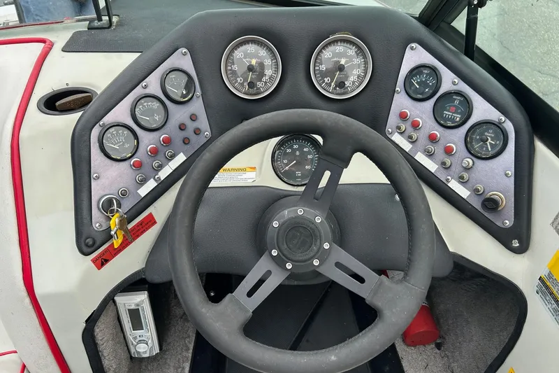 Slide: The Image of 1988 Supra Comp dashboard with steering wheel and instrument gauges. - 3