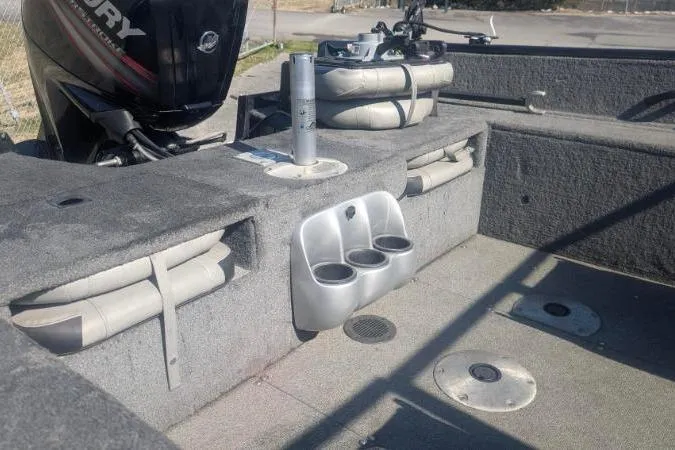 Slide: The Image of 2017 Tracker Pro Guide V-175 Combo boat interior with seating and storage compartments. - 13