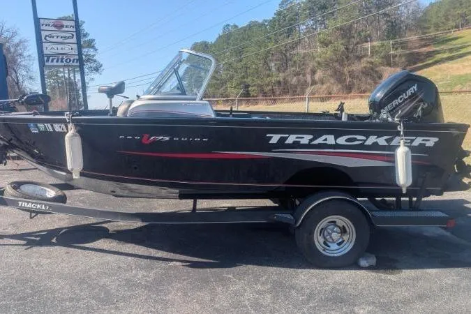 Slide: The Image of 2017 Tracker Pro Guide V-175 Combo boat on trailer, side view. - 7