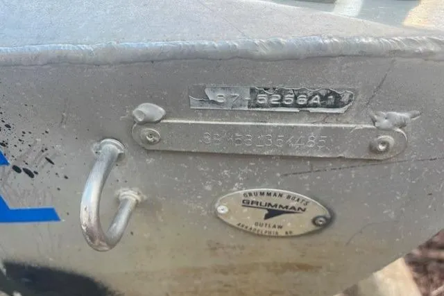 Slide: The Image of Grumman Outlaw 1985 boat hull with identification plates and serial numbers. - 10