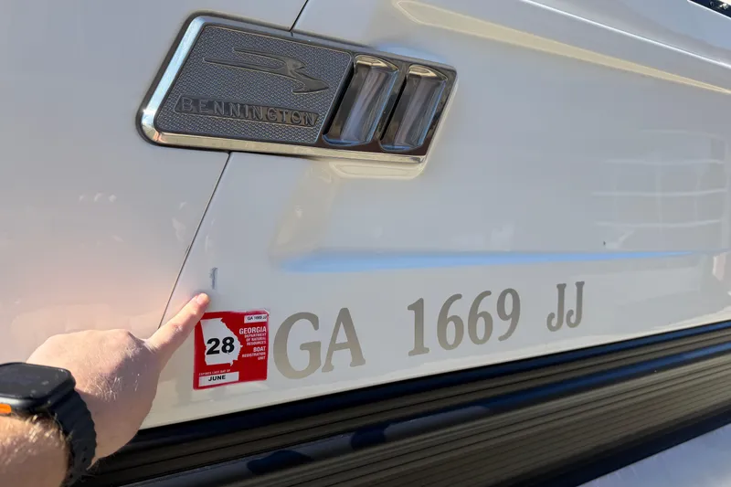 Slide: The Image of 2021 Bennington QX 25 QXFBA boat with Georgia registration sticker and number GA 1669 JJ. - 10