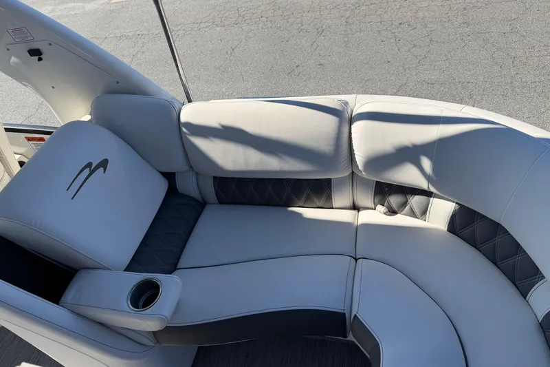 Slide: The Image of Luxurious seating on 2021 Bennington QX 25 QXFBA pontoon boat, featuring elegant upholstery. - 14