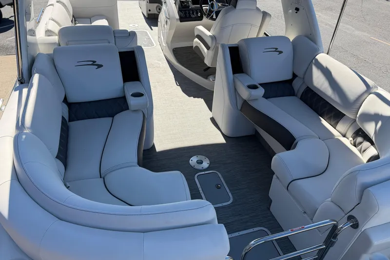 Slide: The Image of Luxurious interior of 2021 Bennington QX 25 QXFBA pontoon boat with plush seating. - 15
