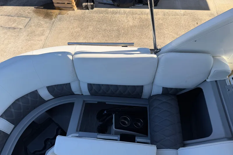 Slide: The Image of 2021 Bennington QX 25 QXFBA boat interior with white and gray seating. - 16
