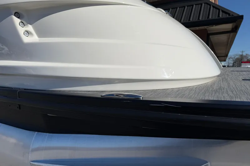 Slide: The Image of 2021 Bennington QX 25 QXFBA boat detail, showcasing sleek design and modern finish. - 2