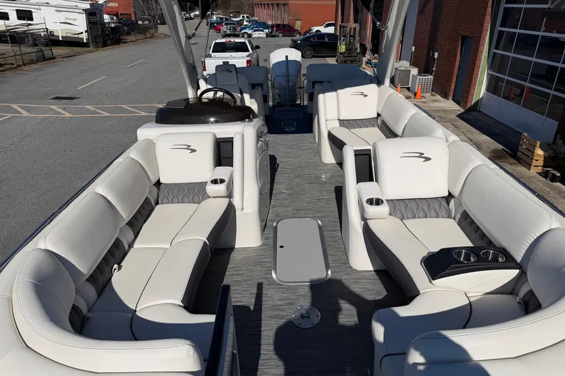Slide: The Image of 2021 Bennington QX 25 QXFBA pontoon boat with luxurious seating and modern design. - 21