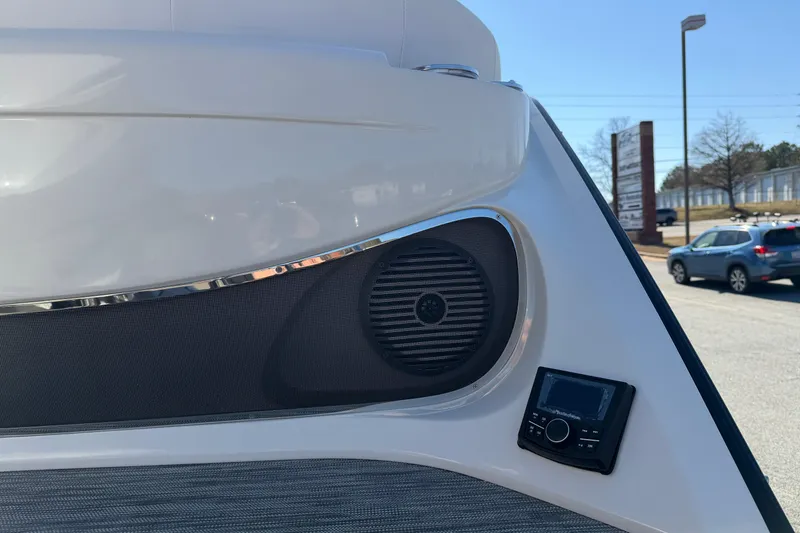 Slide: The Image of 2021 Bennington QX 25 QXFBA boat with speaker and control panel detail. - 7