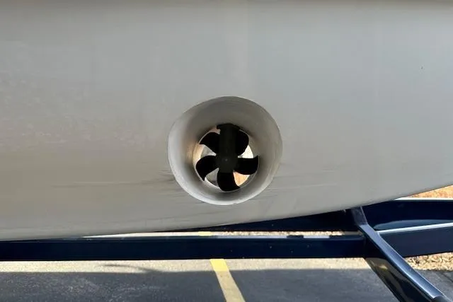 Slide: The Image of 2023 Regal 2800 Bowrider boat with visible bow thruster detail. - 13