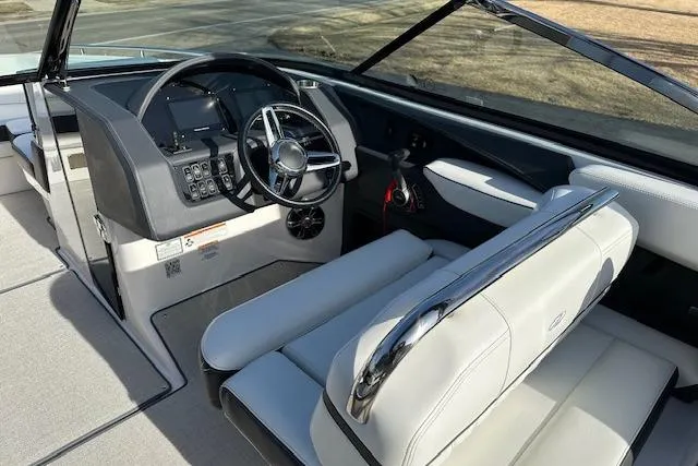 Slide: The Image of 2023 Regal 2800 Bowrider interior with sleek dashboard and comfortable seating. - 15