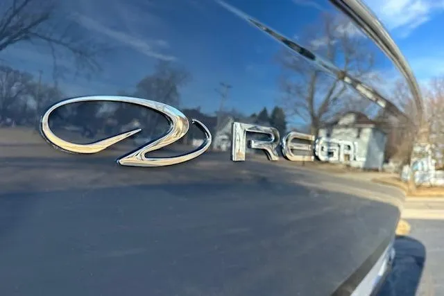 Slide: The Image of 2023 Regal 2800 Bowrider logo on sleek, reflective surface. - 9