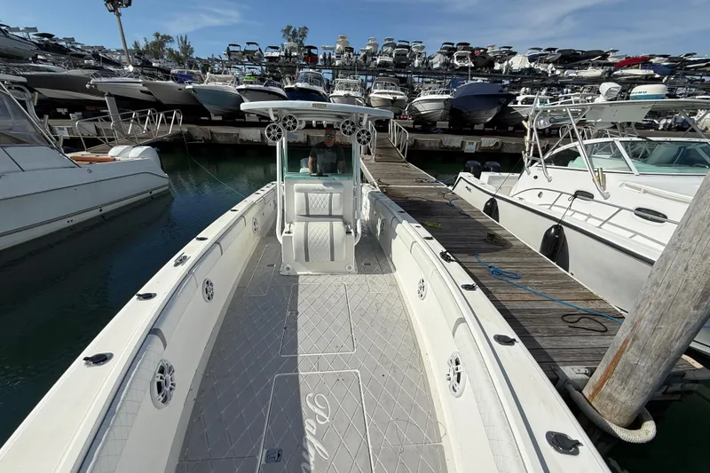 Slide: The Image of 2001 Palmetto Custom 36 boat docked at marina. - 10