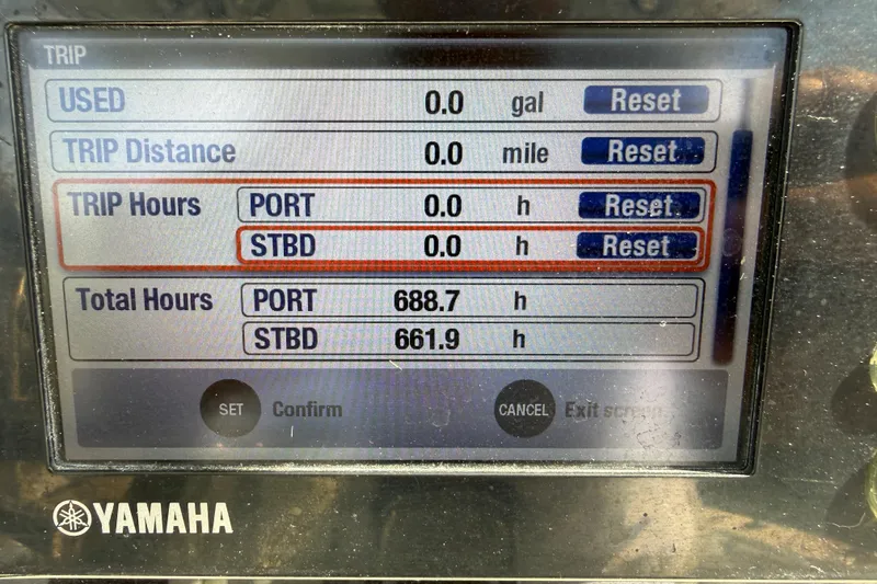 Slide: The Image of Yamaha display showing trip and total hours for Palmetto Custom 36, 2001 model. - 14
