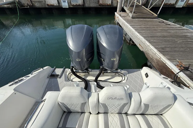 Slide: The Image of 2001 Palmetto Custom 36 boat with dual V8 engines docked at marina. - 20
