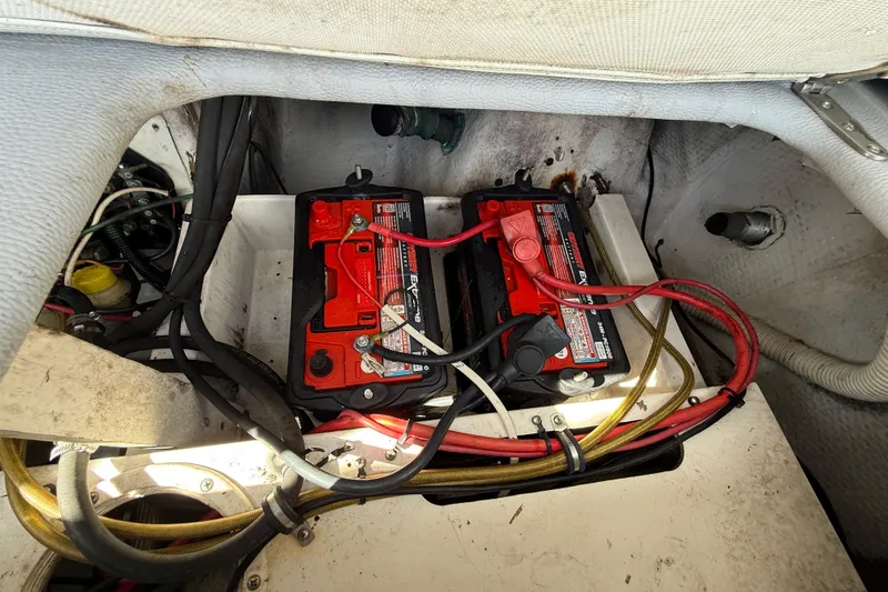 Slide: The Image of Batteries in the engine compartment of a 2001 Palmetto Custom 36 boat. - 22