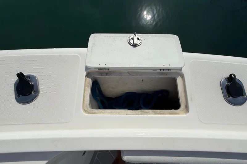 Slide: The Image of Storage compartment on a 2001 Palmetto Custom 36 boat. - 25