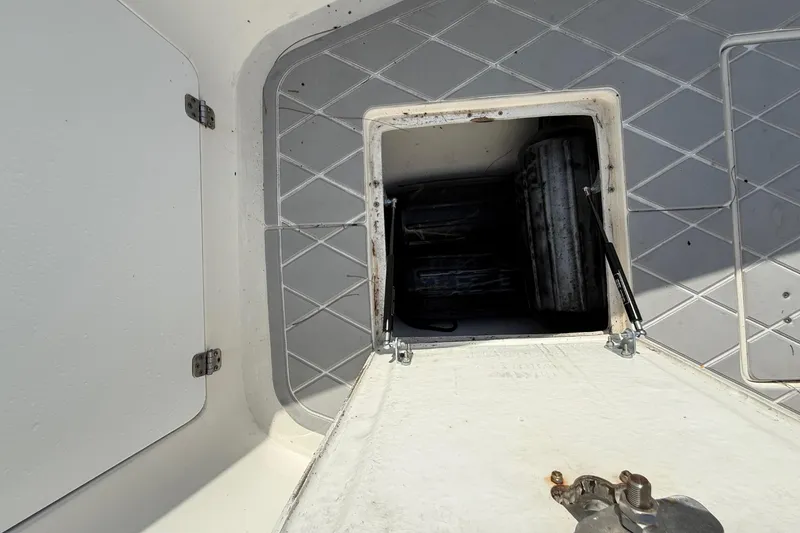 Slide: The Image of Storage compartment on a 2001 Palmetto Custom 36 boat. - 28