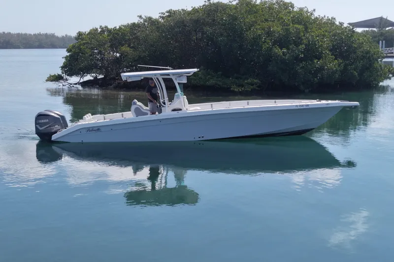 Slide: The Image of 2001 Palmetto Custom 36 boat on calm water with Yamaha outboard motor. - 3