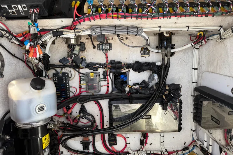 Slide: The Image of Electrical wiring and components inside a 2001 Palmetto Custom 36 boat. - 30