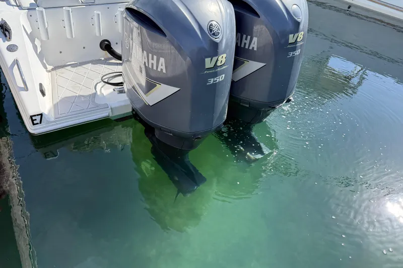 Slide: The Image of Twin Yamaha V8 350 engines on a 2001 Palmetto Custom 36 boat. - 8