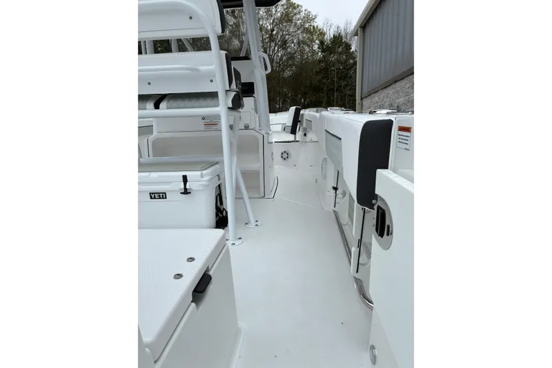 Slide: The Image of 2026 Blackfin 222 CC boat interior with seating and storage compartments. - 9