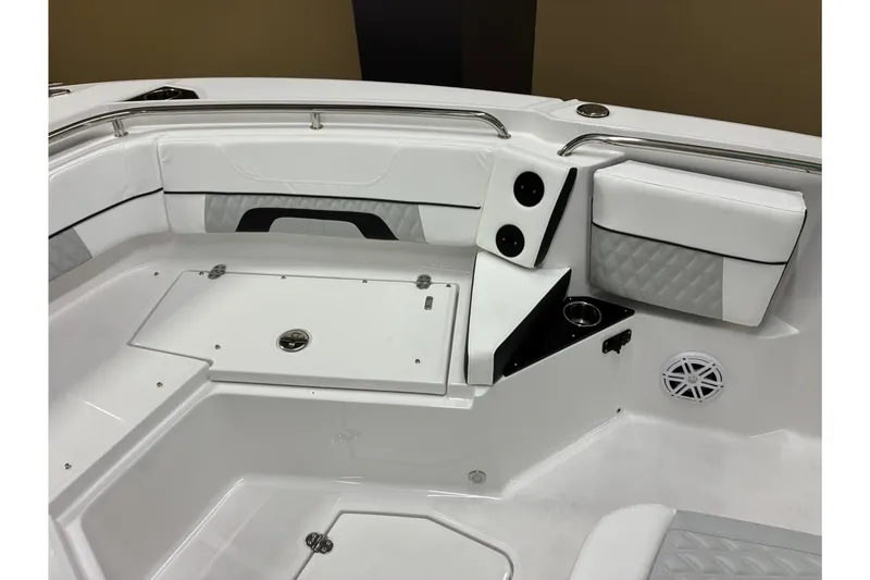 Slide: The Image of Interior of 2026 Blackfin 252 CC boat with white seating and speaker system. - 14