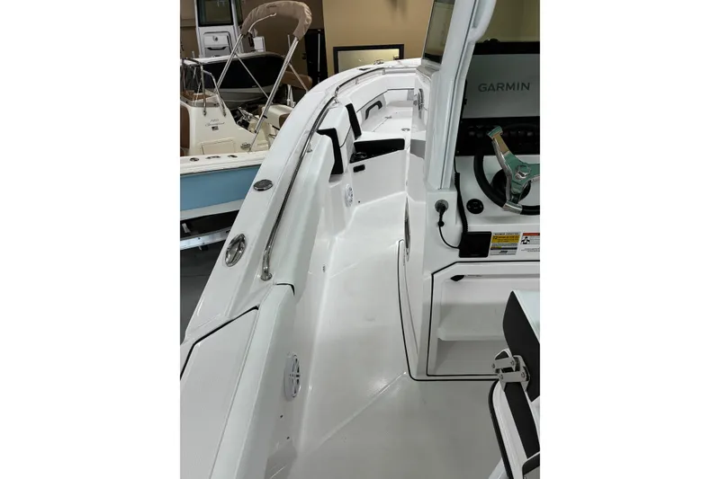 Slide: The Image of 2026 Blackfin 252 CC boat interior with Garmin navigation system. - 17