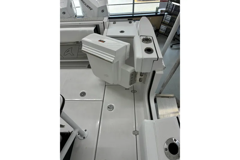 Slide: The Image of 2026 Blackfin 252 CC boat interior with seating and storage compartments. - 21