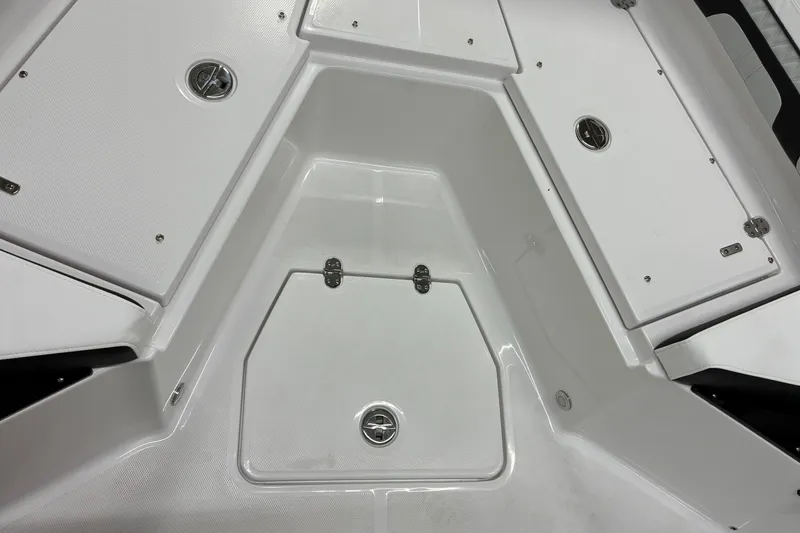 Slide: The Image of 2026 Blackfin 252 CC boat deck with storage compartments. - 29