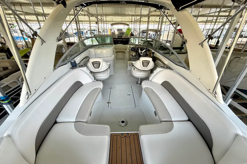 Slide: The Image of 2008 Crownline 260 LS boat interior with spacious seating and modern design. - 19