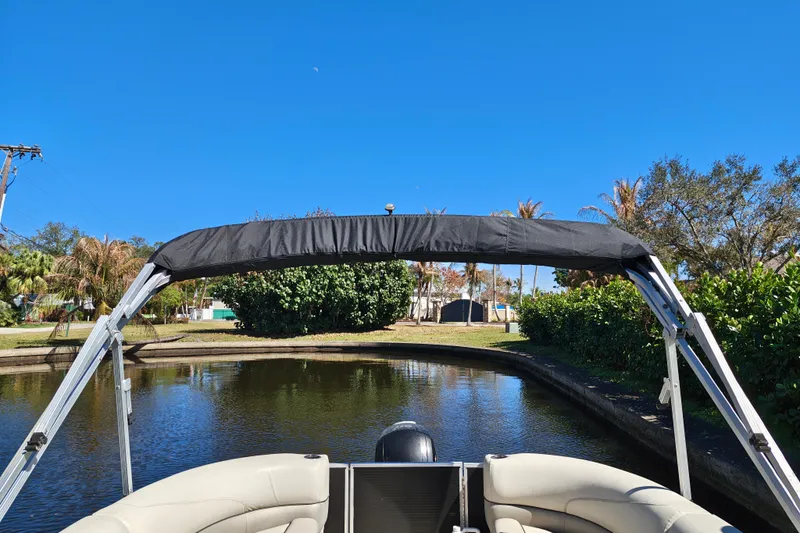 Slide: The Image of 2020 Cypress Cay Seabreeze 232 pontoon boat with comfortable seating and sleek design. - 18