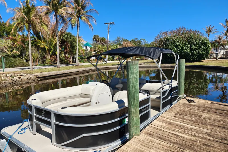 Slide: The Image of 2020 Cypress Cay Seabreeze 232 pontoon boat with spacious seating and sleek design. - 19