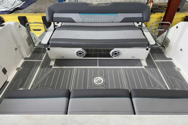 Slide: The Image of 2026 Regal 38 Surf boat interior with sleek seating and modern design. - 11