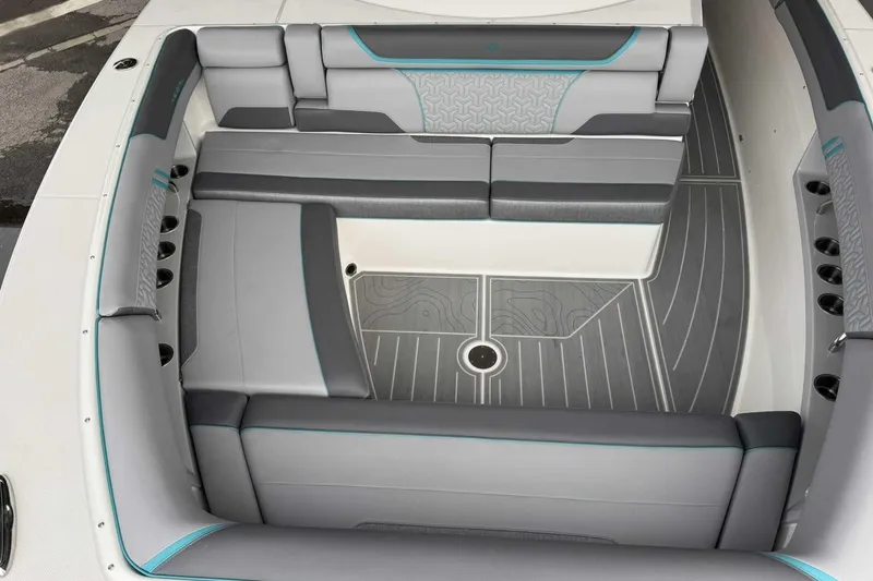 Slide: The Image of 2026 Regal 38 Surf boat interior with sleek gray seating and modern design. - 23