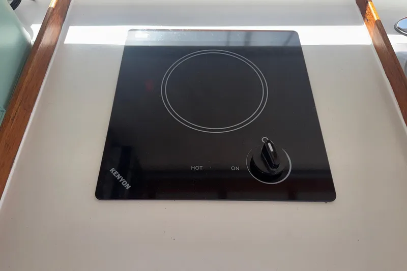 Slide: The Image of Kenyon electric cooktop on 1966 Grand Banks 32 Sedan boat. - 23